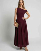 Valencia Maxi Dress - Elegant burgundy one shoulder A-line dress by Lauven, offering graceful flow and sophistication.
