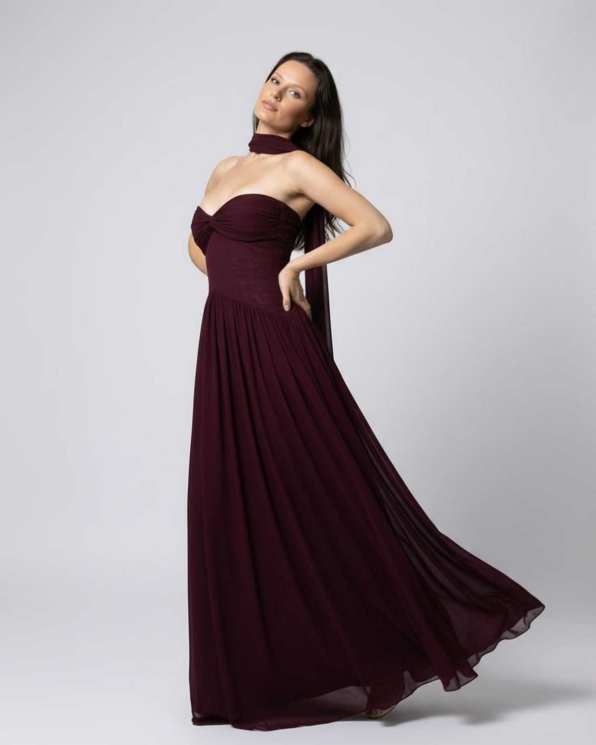 Valencia Maxi Dress - Elegant burgundy strapless maxi dress by Lauven with flowing skirt and structured bodice.