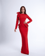 Valencia Maxi Dress by Lauven in red, featuring long sleeves, cut-out waist, and sculptural bows for a modern look.