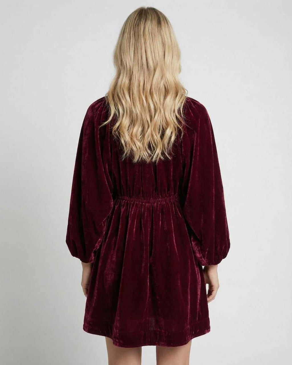Valencia Mini Dress in burgundy velvet, showcasing long sleeve V neck silhouette from Lauven, perfect for elegant occasions.