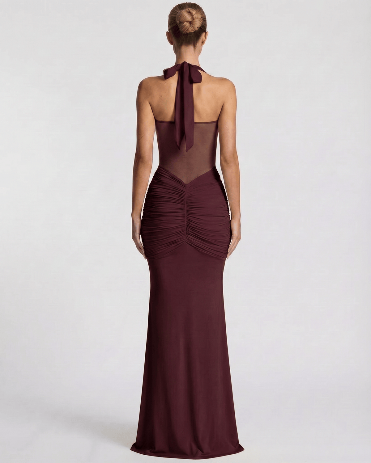 Valora Maxi Dress back view, burgundy halter design, mesh panel, mermaid silhouette by Lauven.