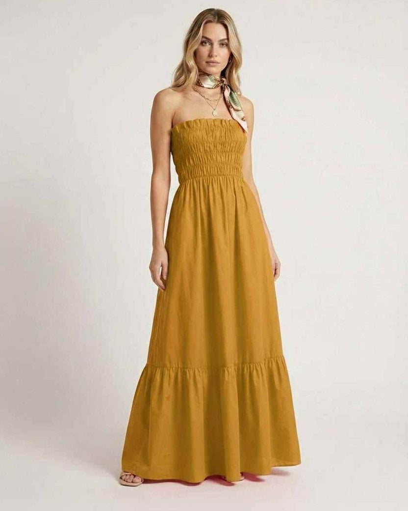 Valora Maxi Dress: Mustard yellow strapless dress with smocked bodice, perfect summer style by Lauven.