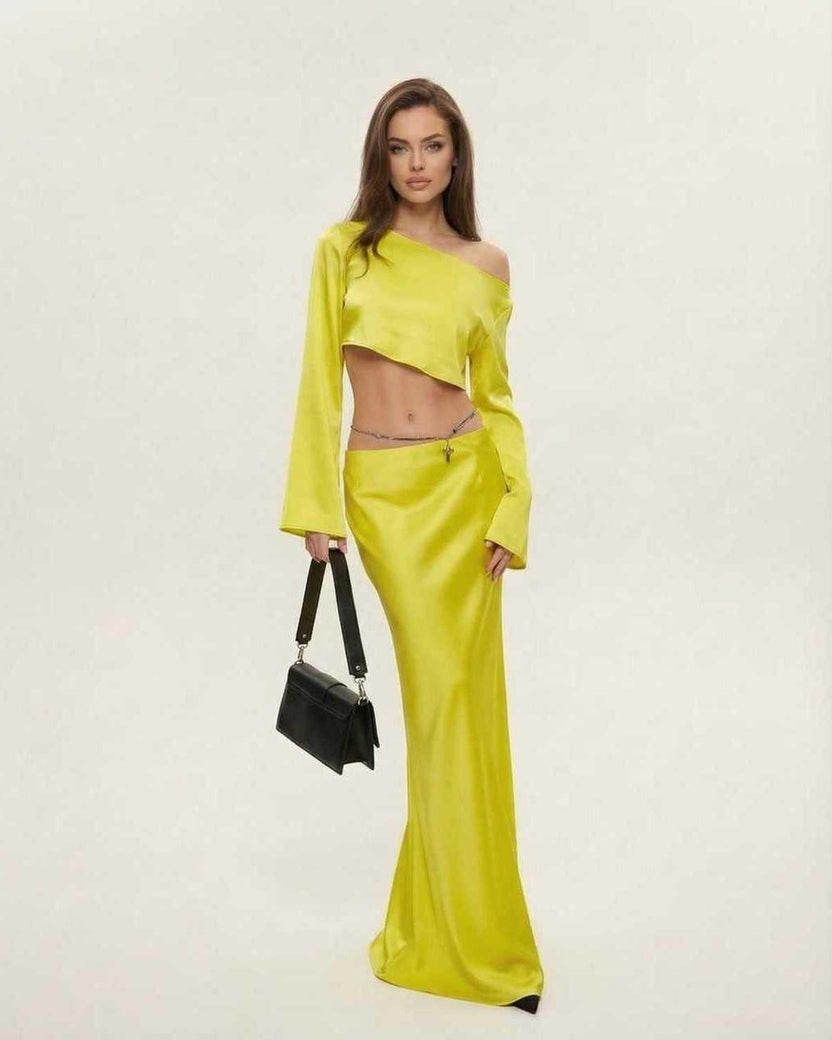 Vega Midi Dress by Lauven in vibrant yellow, featuring a sleek asymmetrical silhouette for club-ready elegance.