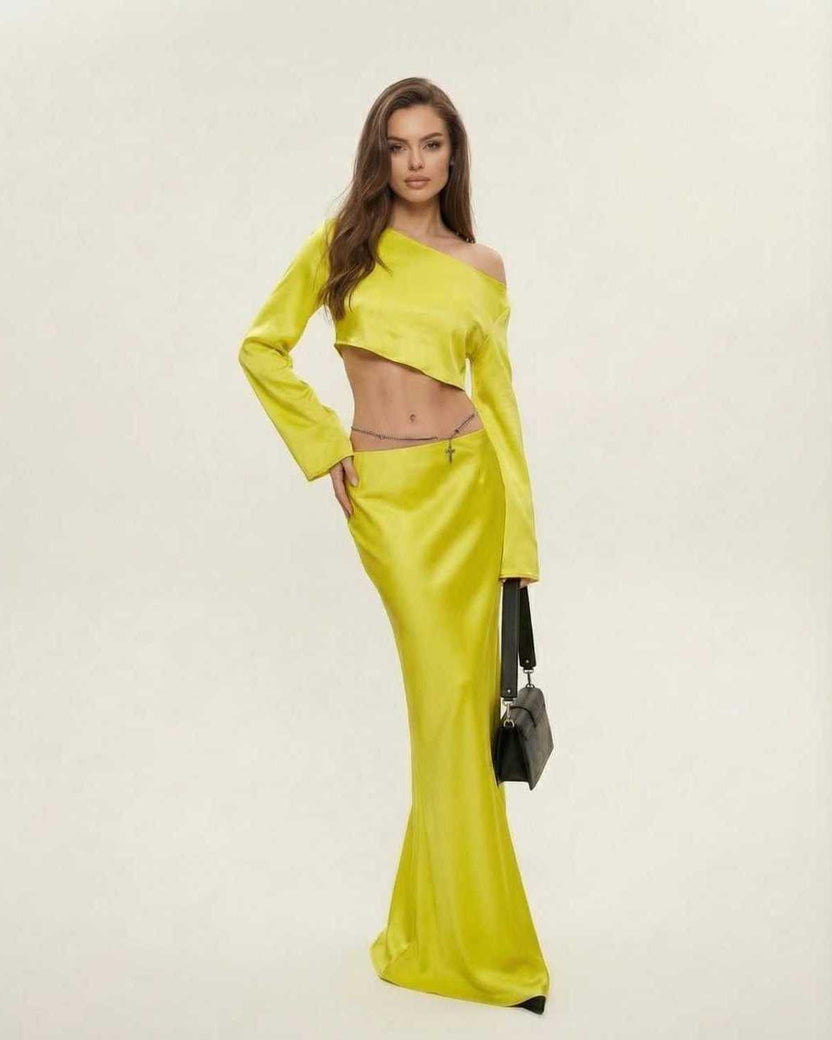 Vega Midi Dress by Lauven in vibrant yellow, featuring an asymmetrical silhouette and sleek design for a stunning evening look.