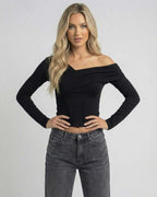 Vela Long Sleeve by Lauven, women's black off-the-shoulder long sleeve top with chic cold shoulder design.