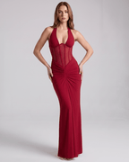 Velmira Maxi Dress in red, featuring a halter neck and sheer mesh panel for a sculpted look and flexible feel by Lauven.