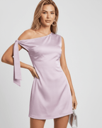Veloura Mini Dress in soft satin finish with asymmetric neckline, perfect for versatile occasions by Lauven.