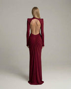 Verona Maxi Dress showcasing a bold red color, high neck, long sleeves, and ruched open back design by Lauven.