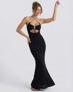 Vesper Maxi Dress by Lauven featuring a sleek black halter neck design with cutouts for evening sophistication.