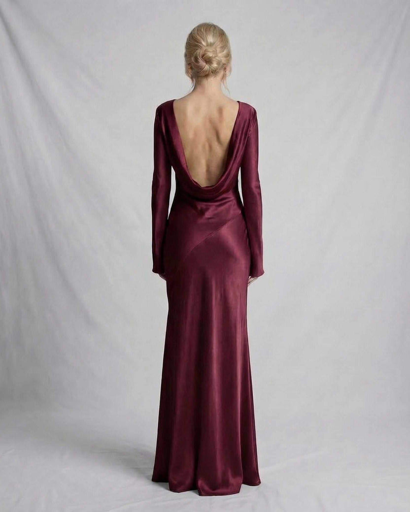 Vesper Maxi Dress by Lauven – Back view showing rich burgundy satin with dramatic low draped back.