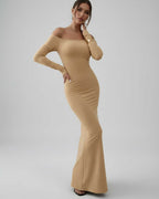 Lauven Vesper Maxi Dress off-shoulder silhouette in neutral beige, showcasing elegant and sleek design.