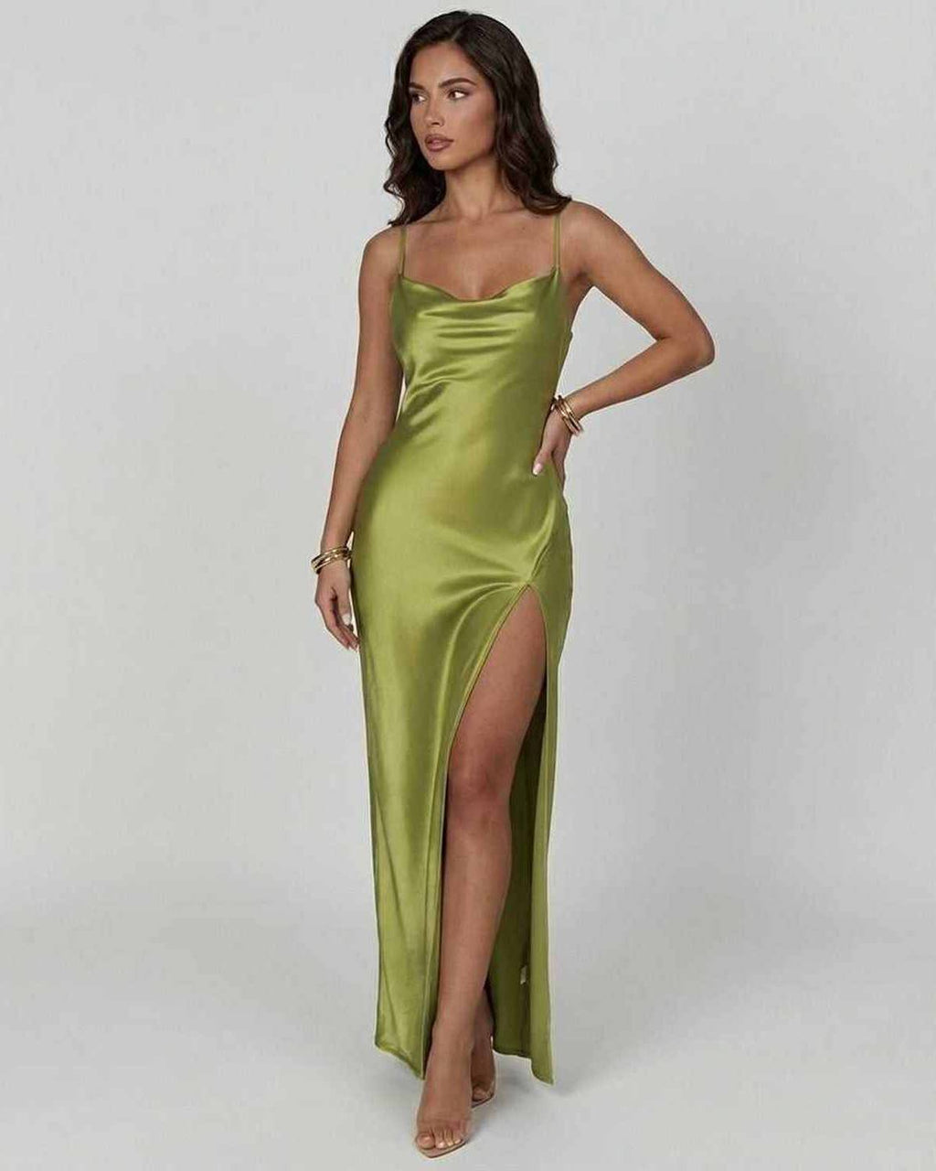 Vesper Maxi Dress by Lauven in bold olive green satin with asymmetrical silhouette and thigh-high slit.