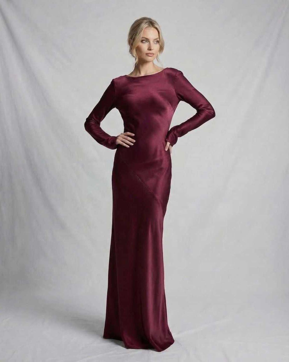 Vesper Maxi Dress by Lauven in rich burgundy satin, featuring a sleek silhouette and elegant long sleeves.
