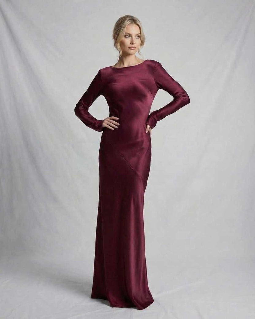 Vesper Maxi Dress by Lauven in rich burgundy satin, featuring a sleek silhouette and elegant long sleeves.