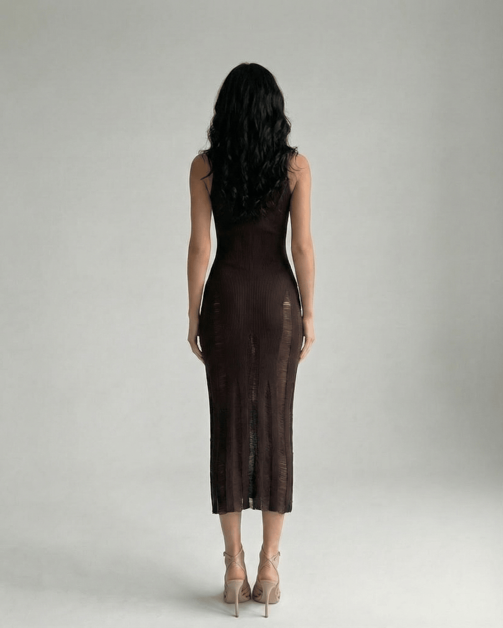 Vesper Midi Dress showcasing a dark brown bodycon fit, sleeveless design, enhancing a refined silhouette by Lauven.