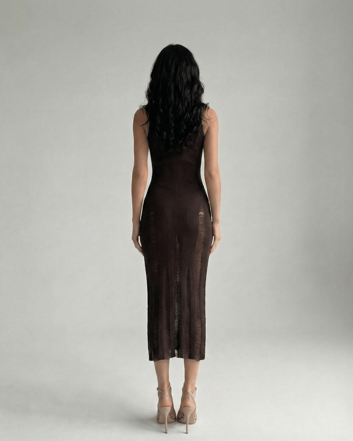 Vesper Midi Dress showcasing a dark brown bodycon fit, sleeveless design, enhancing a refined silhouette by Lauven.