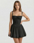 Vesper Mini Dress - Black corset style dress with lace trim, A-line skirt, by Lauven, for a sophisticated and stylish look.