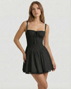 Vesper Mini Dress - Black corset style dress with lace trim, A-line skirt, creating a sophisticated and stylish look by Lauven.