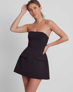Vesper Mini Dress in midnight navy, featuring strapless design, sculpted bodice, and flared skirt by Lauven.
