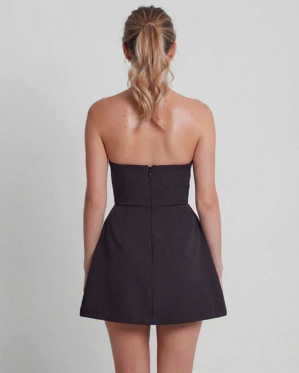 Vesper Mini Dress: Strapless navy mini dress with structured A-line silhouette, showcasing refined elegance from Lauven.