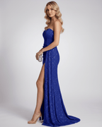 Model wearing the Virelle Maxi Dress, a royal blue sequin maxi dress with a fitted silhouette, exuding elegance by Lauven.