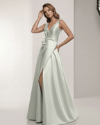 Virelle Maxi Dress in satin sage silver with V-neck, bow detail, and A-line silhouette by Lauven, perfect for elevated occasions.