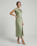 Virgo Midi Dress - Sleek satin dress with twisted-back, cutout detail, exuding elegance in soft sage green by Lauven.