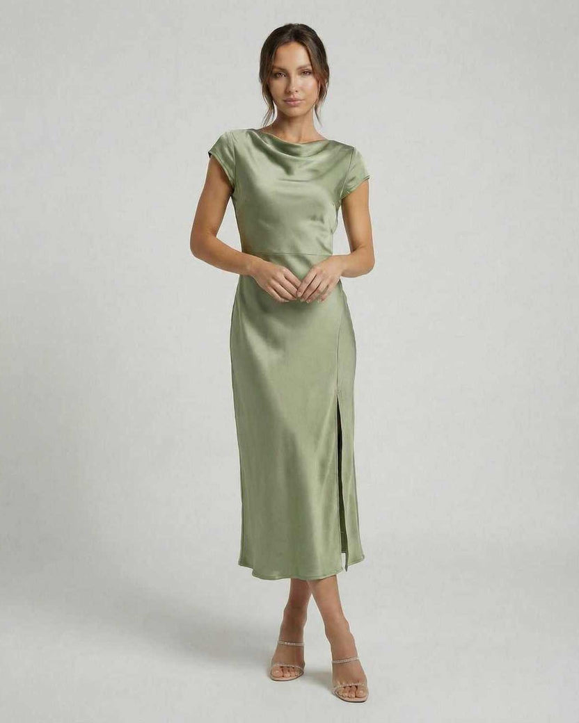 Virgo Midi Dress - Sleek satin dress with twisted-back, cutout detail in soft sage green by Lauven.
