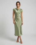 Virgo Midi Dress showcasing a sleek satin material, twisted back, and cutout detail in soft sage green by Lauven.