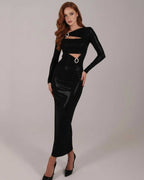 Zafira Maxi Dress by Lauven - Black long sleeve dress with cut-out details and metallic accents for a bold, modern look.