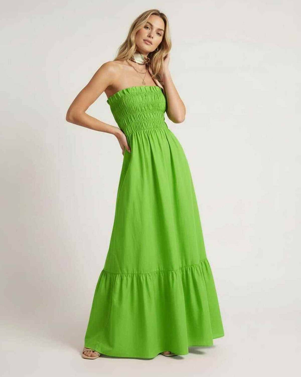 Zafira Maxi Dress in vibrant green with smocked bodice, providing a flowing silhouette by Lauven.