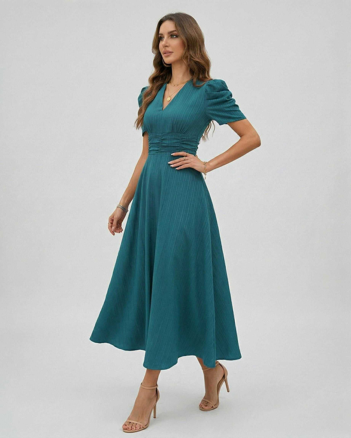 Zahara Midi Dress in teal with puff sleeves and a V-neckline, perfect for weddings and elegant occasions, by Lauven.