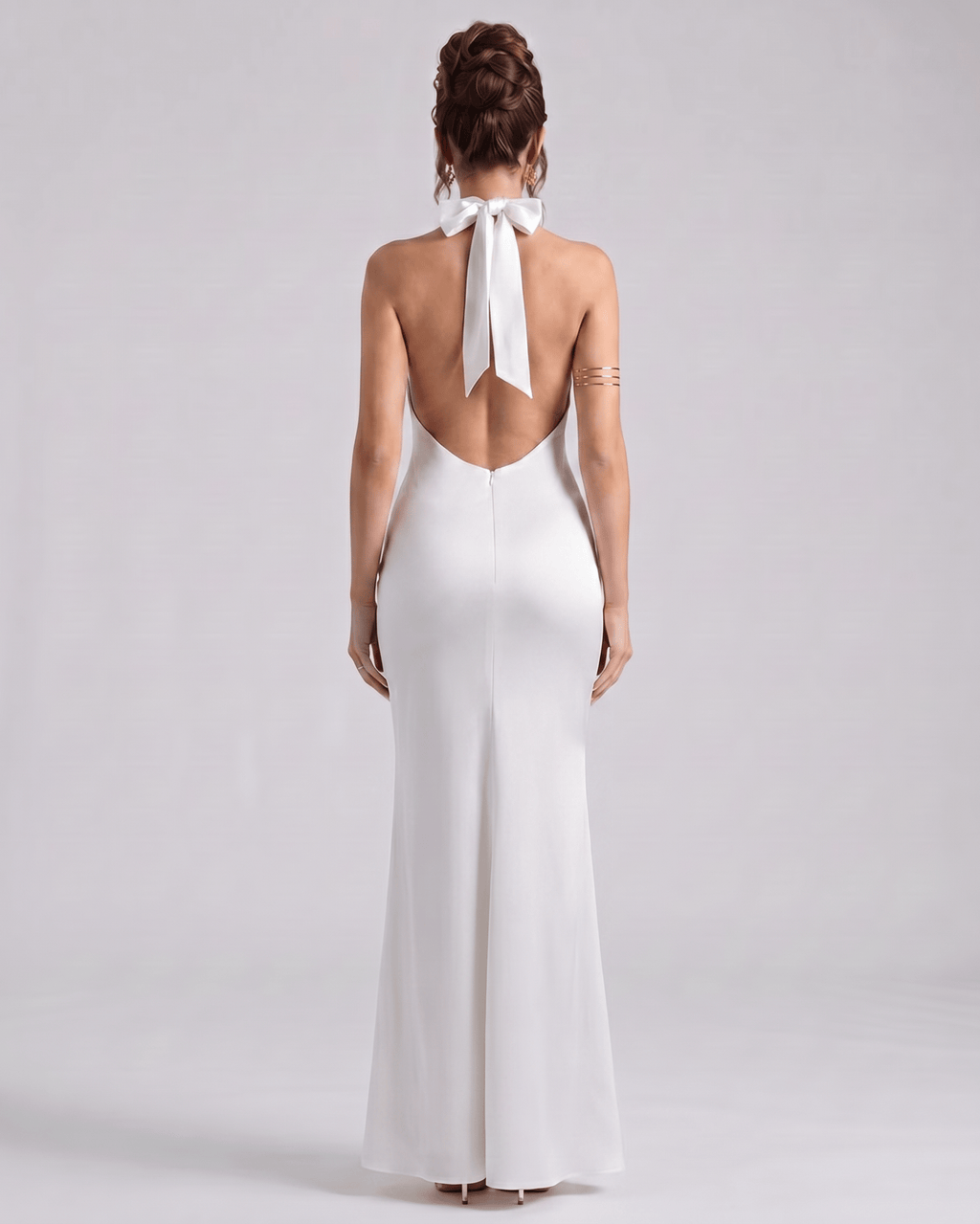 Zerelle Maxi Dress back view showing halter neckline, smooth polyester fabric, and elegant ruffle details by Lauven.