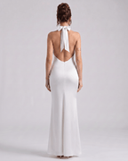 Zerelle Maxi Dress back view showing halter neckline, smooth polyester fabric, and elegant ruffle details by Lauven.